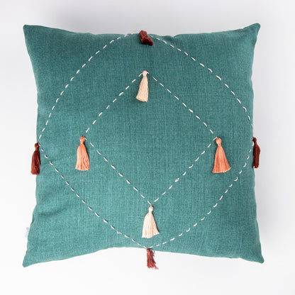 Front of handmade cushion cover with embroidery and tassels