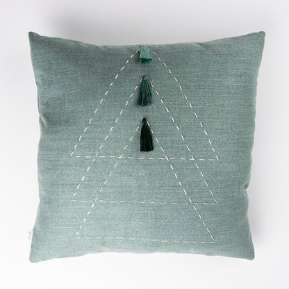 Front of sage green cushion cover with embroidery and tassels