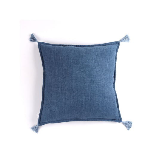 Front of denim blue handmade cushion cover with tassels