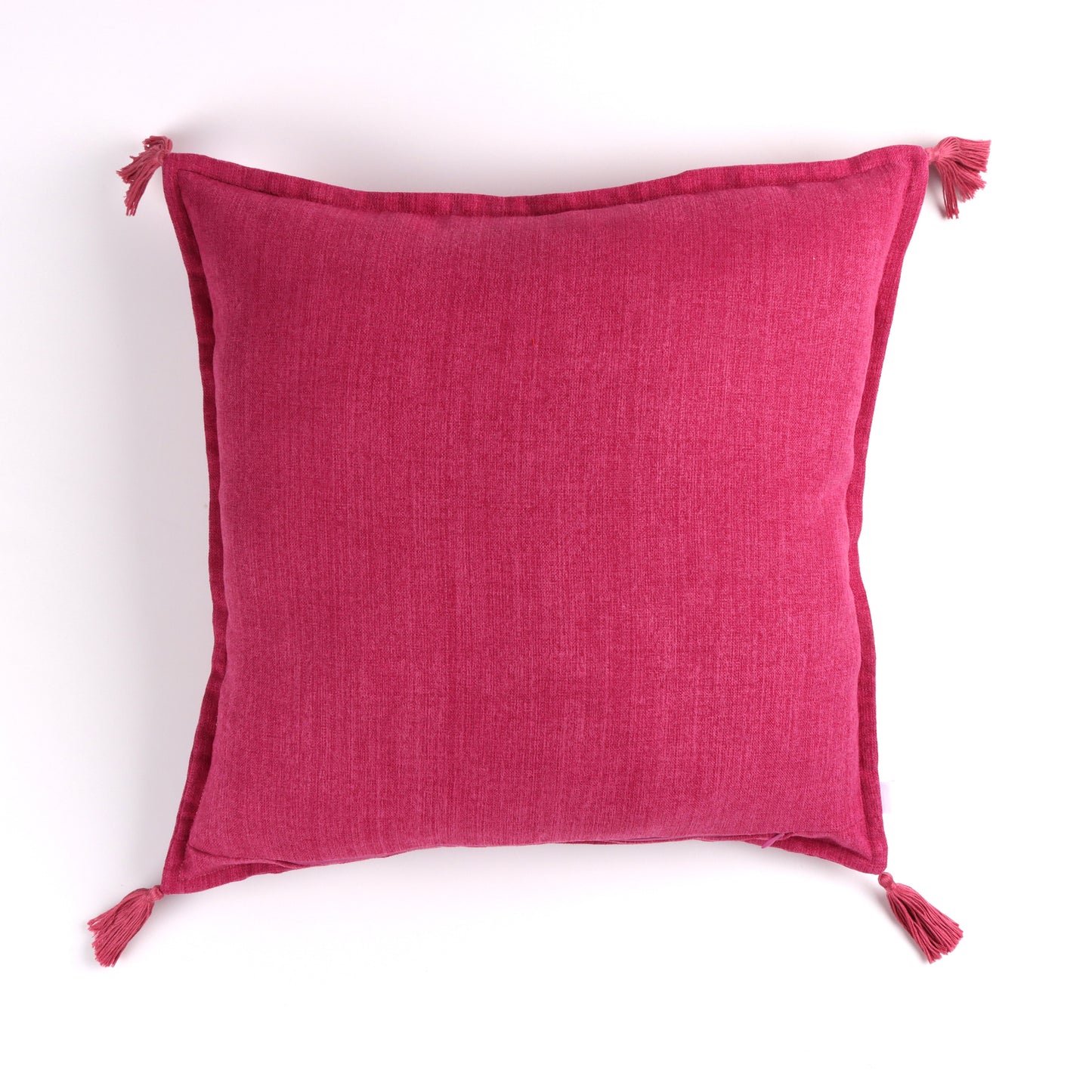 Back of fuchsia pink handmade cushion cover with tassels