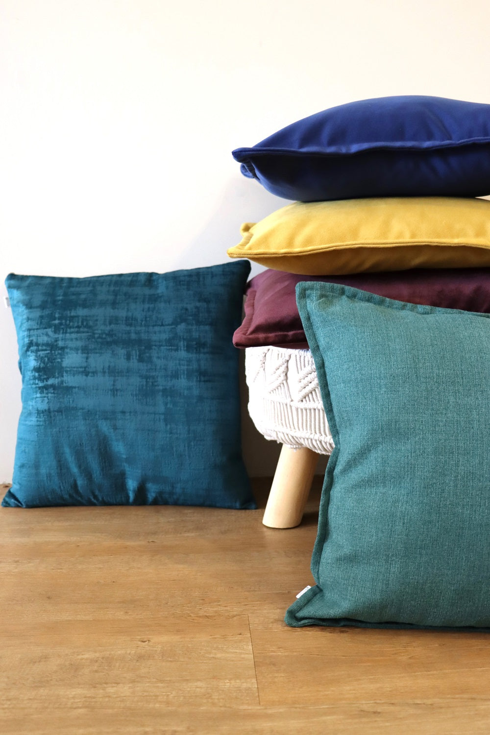 Lifestyle photo of textured velvet cushion cover with exposed zipper