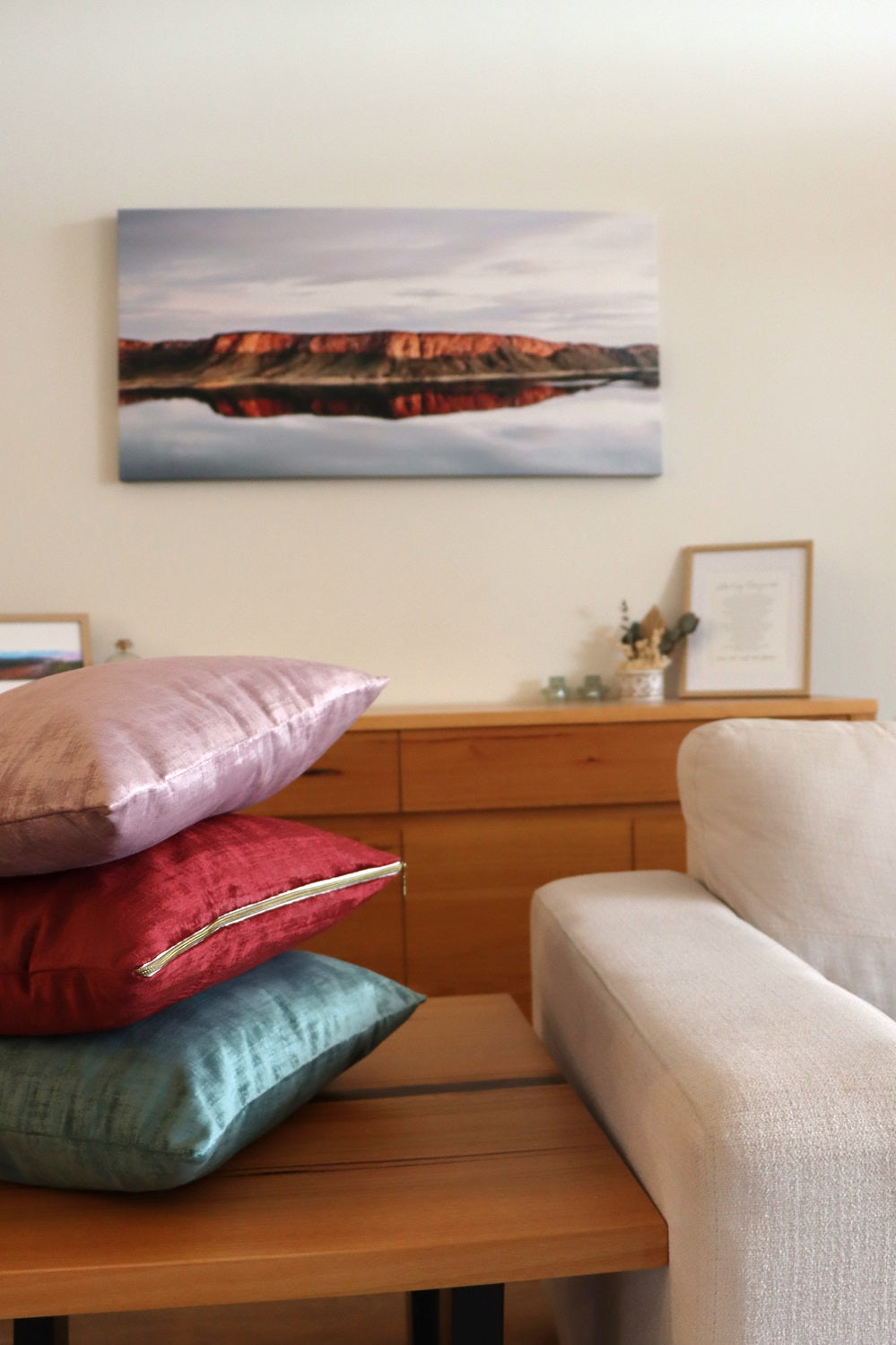 Stack of handmade textured velvet cushion cover with exposed zipper