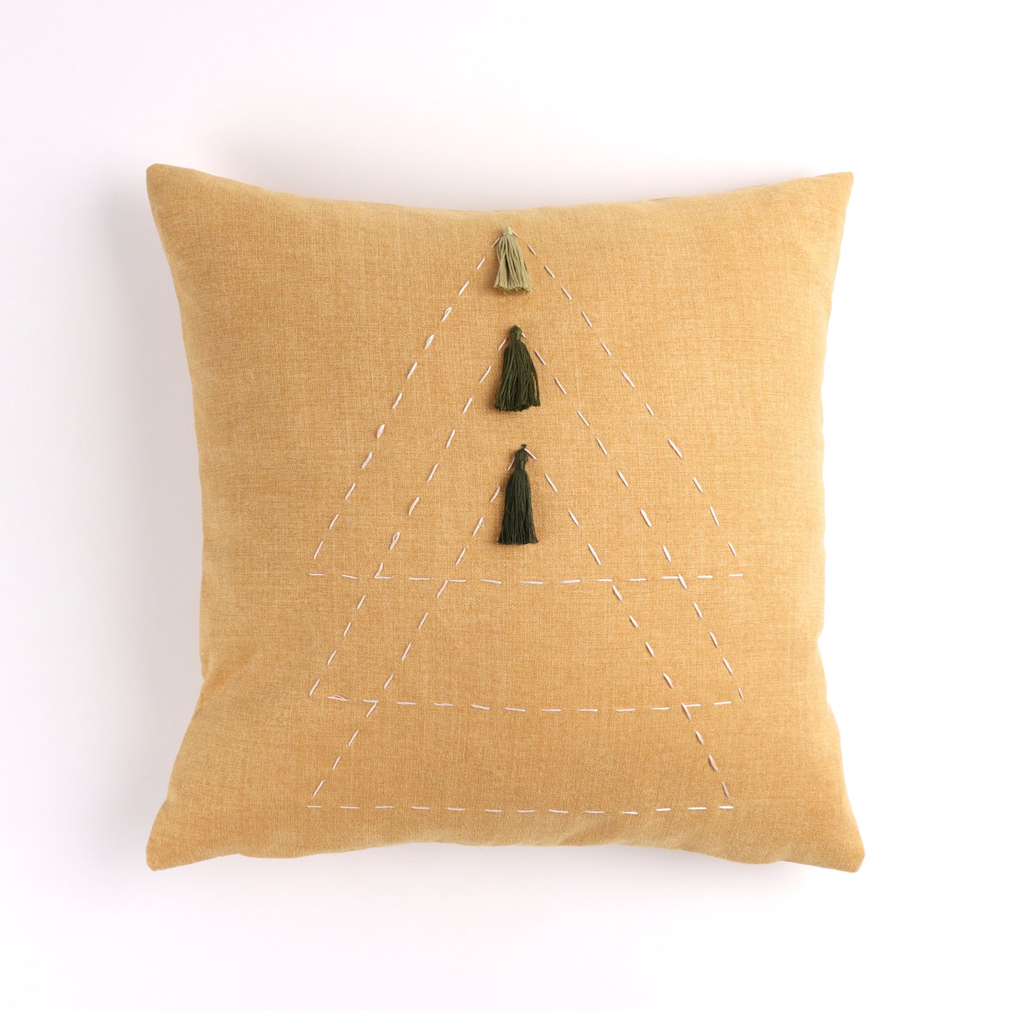 Front of yellow triangle cushion cover with embroidery and tassels