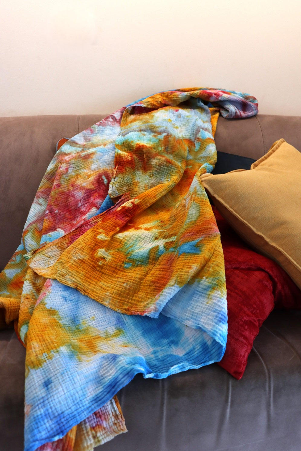 Close up of handmade ice-dyed cotton throw