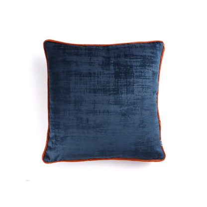 Front of blue textured velvet cushion cover with contrasting piping