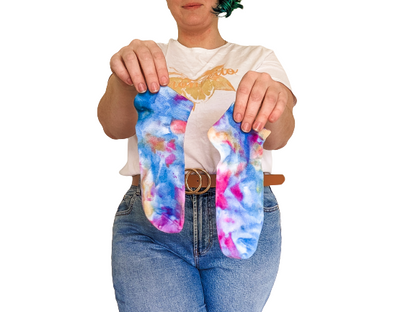 Person holding ankle length Ice-dyed bamboo socks