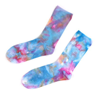 Flat lay of blue and pink Ice-dyed bamboo socks