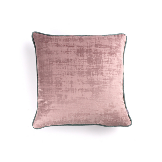 Front of rose pink textured velvet cushion cover with contrasting piping