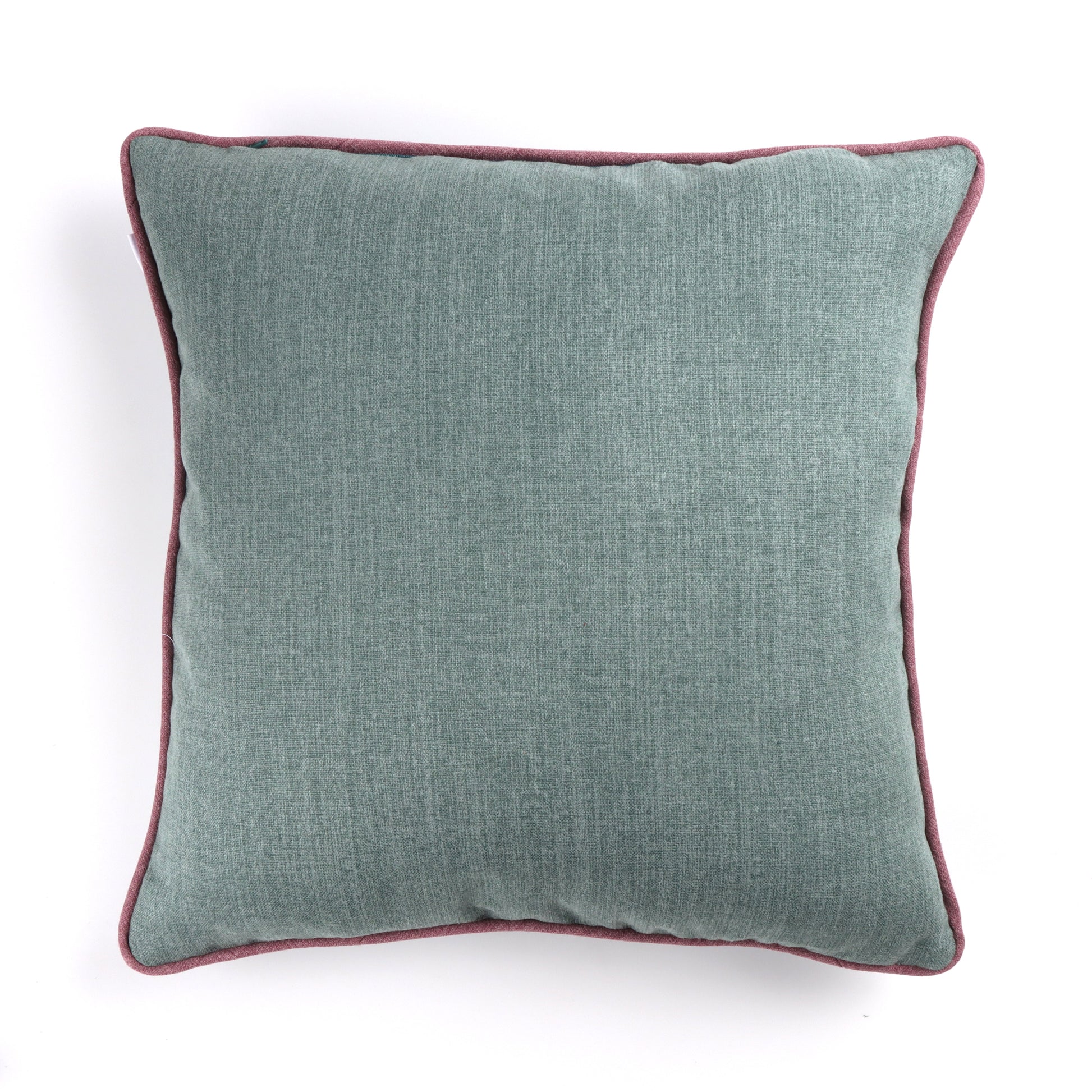 Back of seafoam green textured velvet cushion cover with contrasting piping