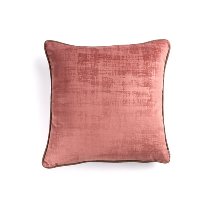 Front of blush pink velvet cushion cover with contrasting piping