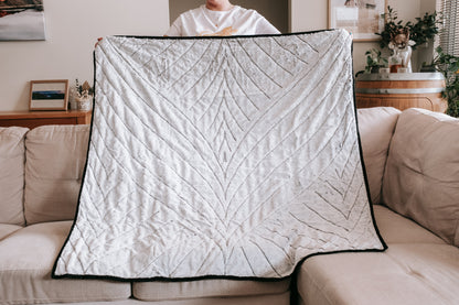 Back of handmade bargello quilt with mink backing