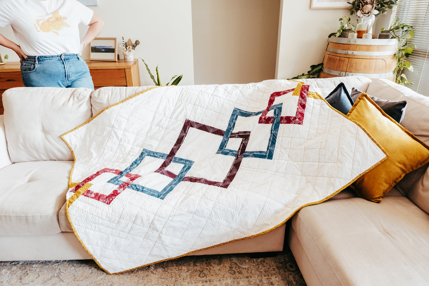 handmade quilt with mink backing on couch