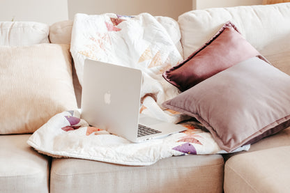 Lifestyle photo of velvet cushion cover with flange edging