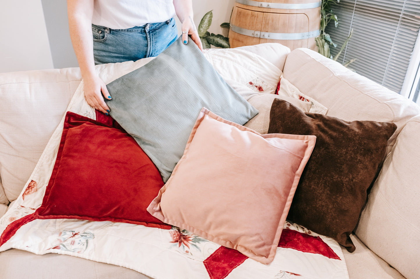 Lifestyle photo of textured velvet cushion cover on sofa