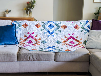 handmade boho quilt with mink backing on sofa